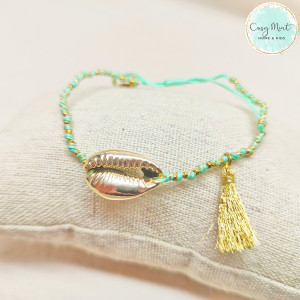 Bracelet fil cowrie vert...