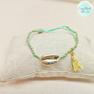 Bracelet fil cowrie vert...