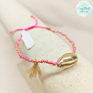 Bracelet fil cowrie corail...